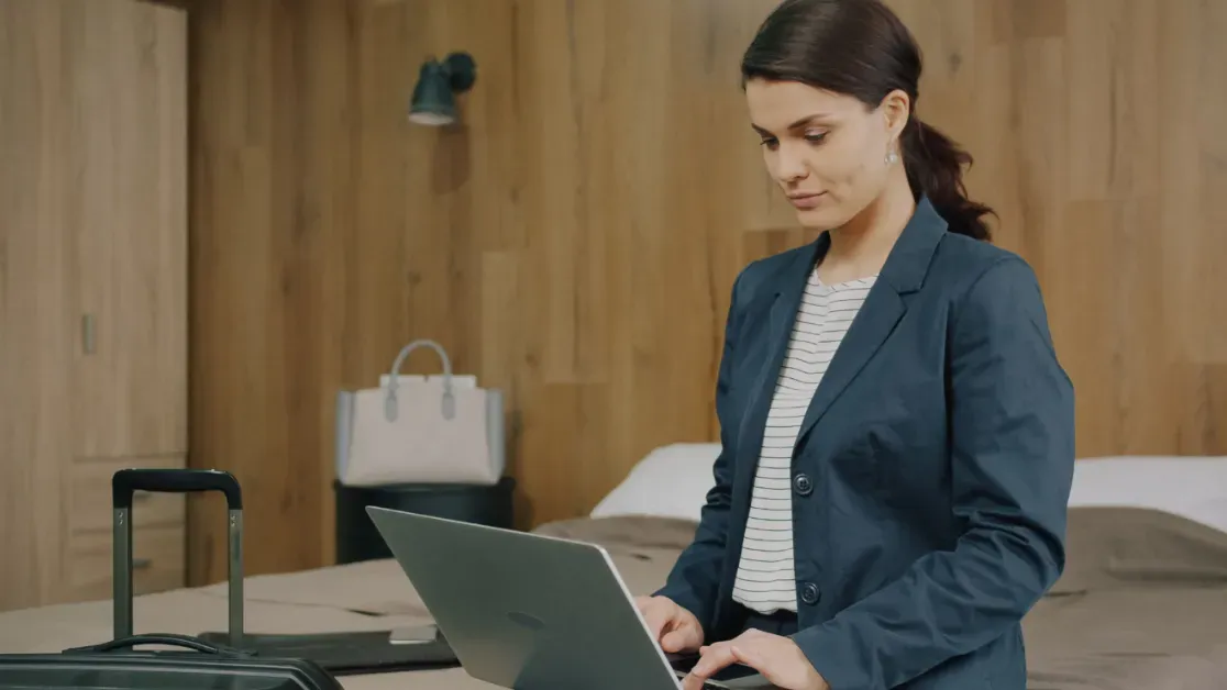 Hotel staff using hotel software to manage housekeeping, tasks, and daily operations